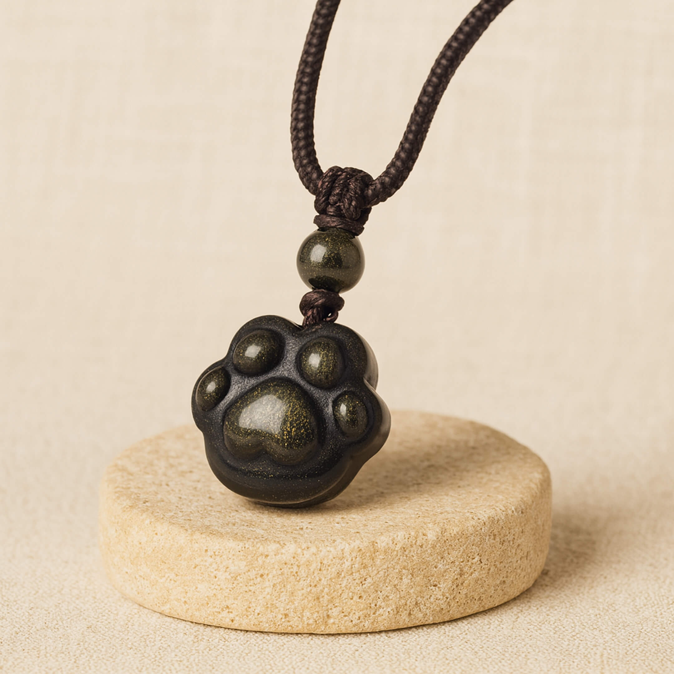 “Eternal Bond” Paw Pendant in Golden Obsidian